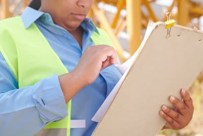 Inspector reviewing comprehensive digital report