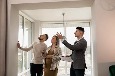 Couple touring home with agent